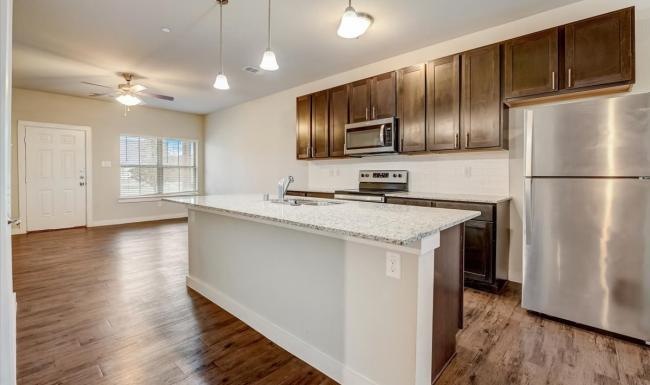 a kitchen with a large island