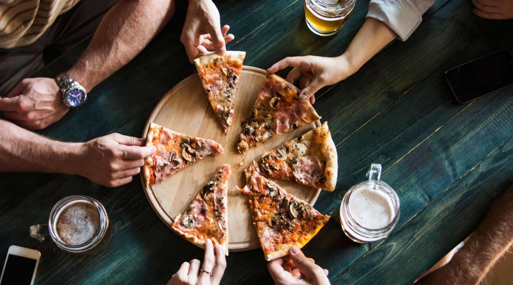 people eating pizza