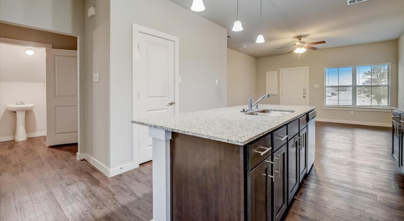 a kitchen with a large island