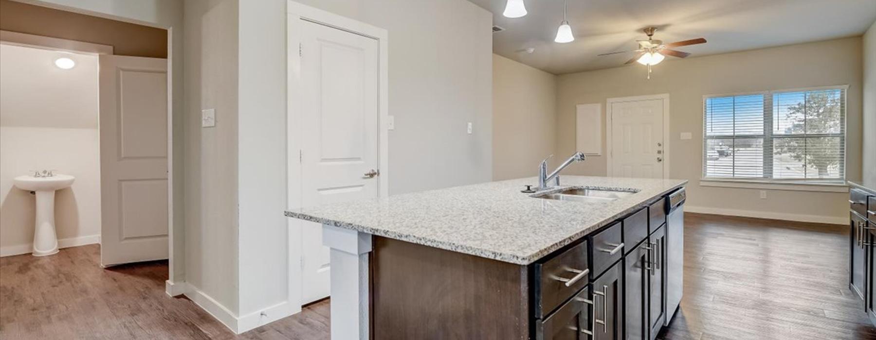 a kitchen with a large island