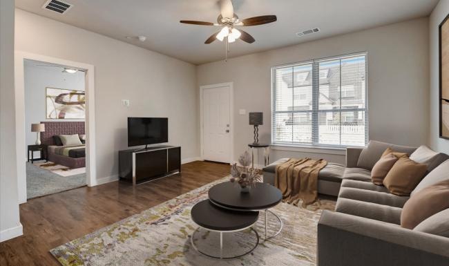 a living room with a fan